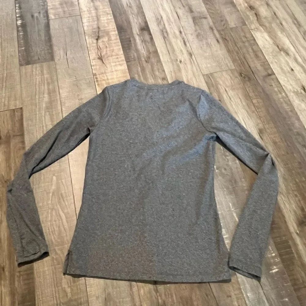Athleta Uptempo Ribbed Henley
Top small Black Heather